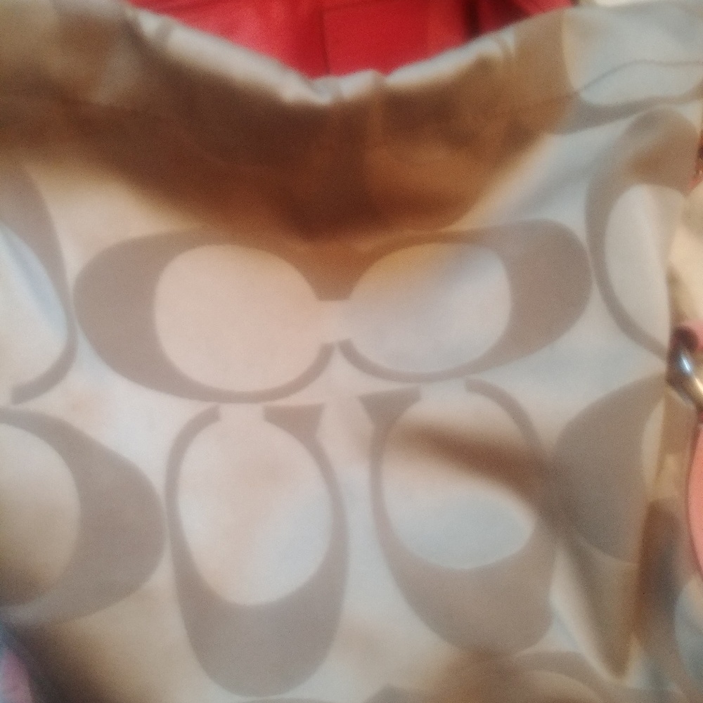 Golden beige with pink Coach bag